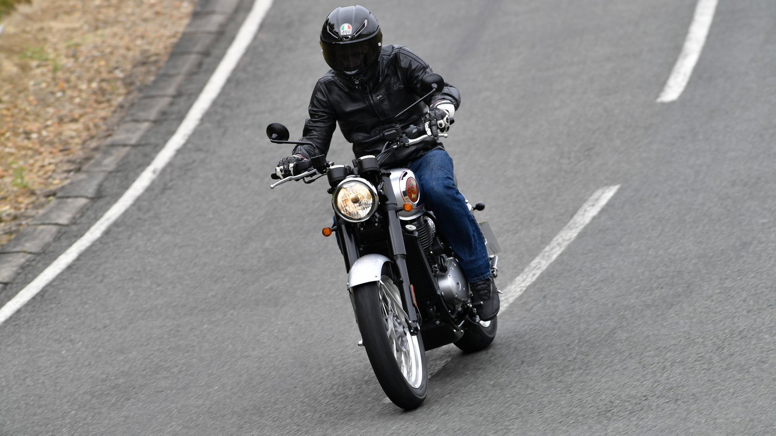 The BSA Gold Star Motorcycle riding on the road